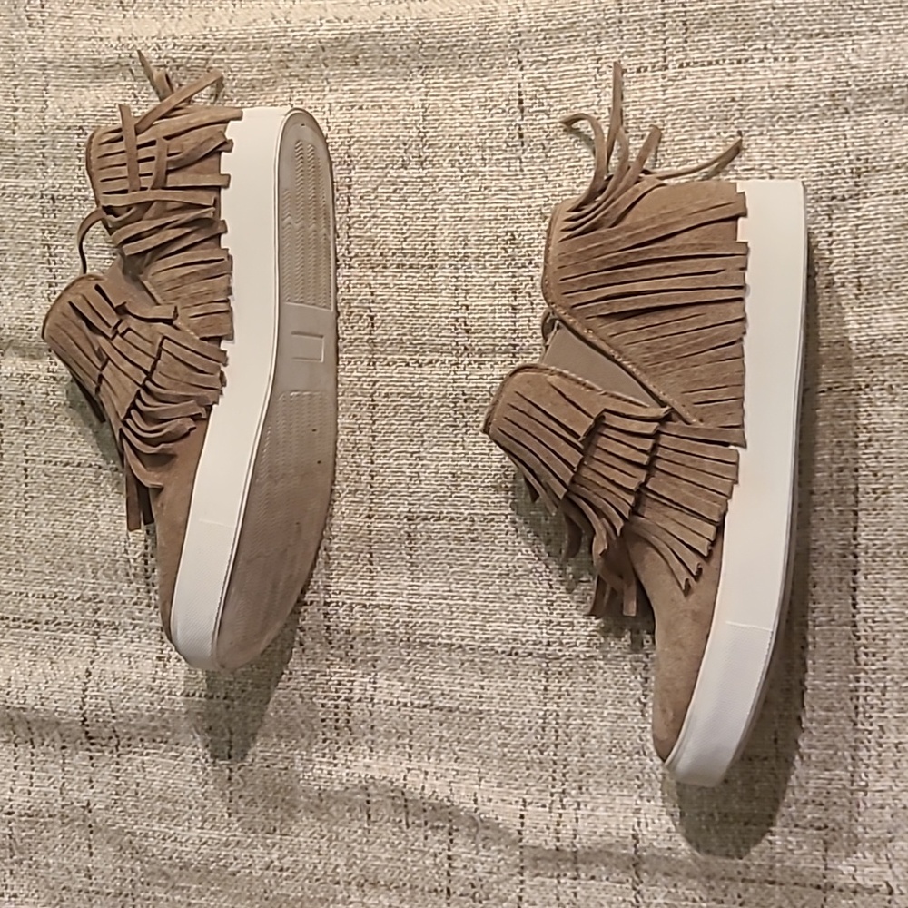 Slip on fringed moccasins Worn less than an hour!!